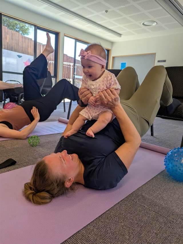 Glute bridge with baby